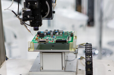 Production of automated robot for print circuit board (PCB) assembly for spot soldering of printed circuit boards.