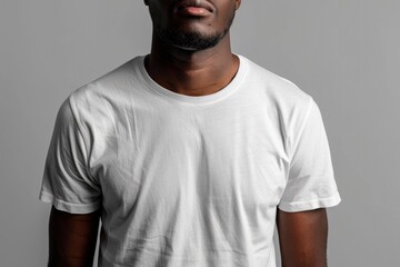 Obraz premium Close-up of a Man's Chest in a White T-Shirt