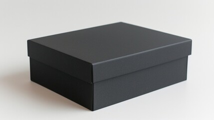 Naklejka premium Sleek Black Gift Box - Minimalist Luxury Packaging for Retail and Branding