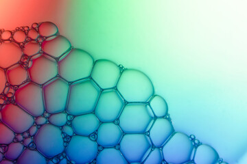 Abstract background bio technology, macro photography foam and water with gradient background. Molecule multicolor backgorund
