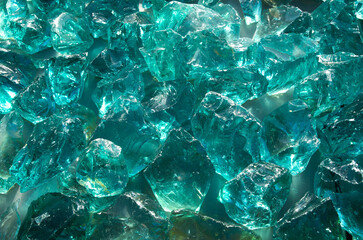 Large pieces of blue broken glass closeup