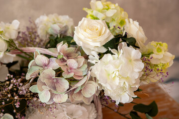 a bouquet of different flowers on the table