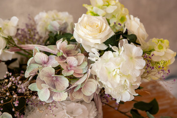 a bouquet of different flowers on the table