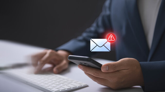 Email hacked warning alert notification, junk mail, scam malware spreading virus on message alert virtual on smartphone. potential cybersecurity threats and warnings.
