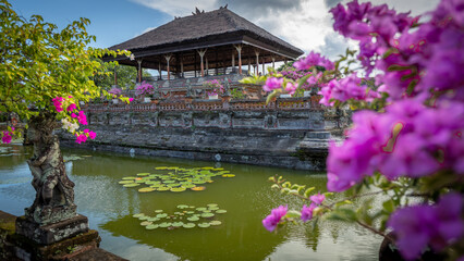 Beautiful Klungkung royal palace Hindu temple with colored flowers In Bali, Indonesia on April 25th 2024