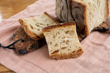 Freshly baked big sourdough traditional italian bread on olive wood fired oven