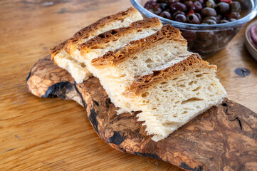 Freshly baked big sourdough traditional italian bread on olive wood fired oven