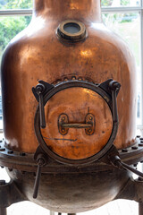 Copper distillation tanks, classic perfume production from natural ingredients in Provence, perfume factory in Grass or Eze, French riviera