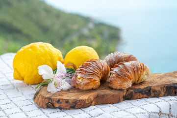 Italian desssert, Naples sfogliatella, shell-shaped layered pastry, with sweet custard-like filling made with semolina, ricotta, and candied citrus fruit