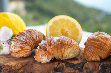 Italian desssert, Naples sfogliatella, shell-shaped layered pastry, with sweet custard-like filling made with semolina, ricotta, and candied citrus fruit
