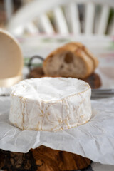 French soft Camembert cheese, original Camembert de Normandie made from raw cow milk