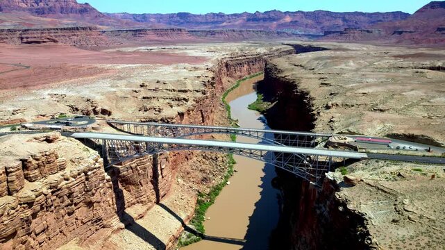 Drone hyper-lapse of Navajo Bridge spanning the Colorado River in Arizona.