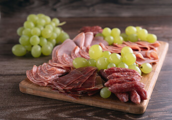 photography, sliced, party, pork, bacon, food, rustic, board, grape, ham, variation, snack, meat, salami, plate, lunch, set, prosciutto, sausage, gourmet, appetizer, cutting board