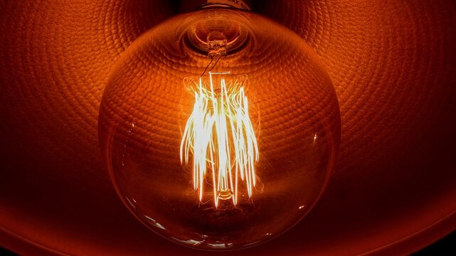 Warm white - orange light bulb with filament