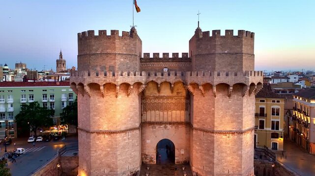 evening view of Valencia Torres de Serranos, sunset aerial view of Valencia old town in Spain, tourism in Southern Europe, travel in Spain