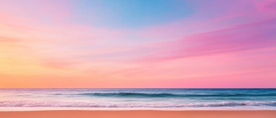 Obraz premium A serene beach at sunset displaying vibrant colors, gentle waves, and a tranquil atmosphere for relaxation and inspiration.