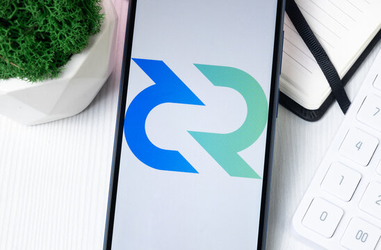 New York, USA - 1 August 2024: Decred DCR Logo on Phone Screen, Crypto Coin Icon