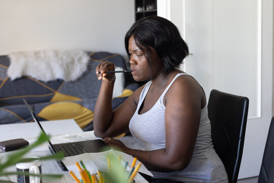 serious woman working from home, thinking, online education, problem