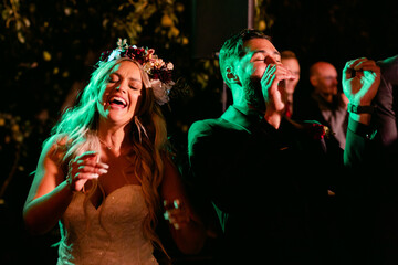 Bride and Groom Partying at Wedding Reception
