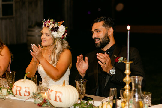 Bride and Groom Emotional and Clapping During Speeches