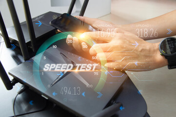 fast internet connection speedtest network bandwidth technology Man using high speed internet with smartphone and laptop computer. 5G quality, speed optimization.