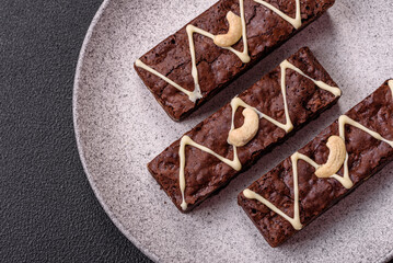 Delicious sweet brownies with chocolate and nuts