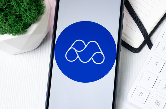 New York, USA - 1 August 2024: Monnos MNS Logo on Phone Screen, Crypto Coin Icon