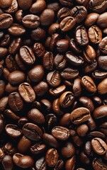 A close up of coffee beans with a dark brown color