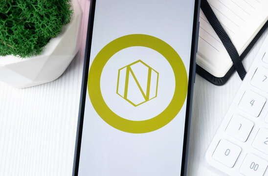 New York, USA - 1 August 2024: Neumark NEU Logo on Phone Screen, Crypto Coin Icon
