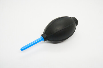 cleaning the sensor with lens cleaning paper, lens cleaning solution and air rubber blower, selective focus.
