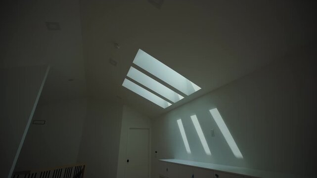 Skylight window in a modern apartment, home interior. Wide view