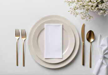 Elegant dining table setting with blank white menu mockup laying on plate. Restaurant napkin invitation card template with copy space for weddings, romantic dinner
