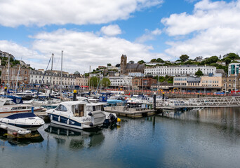 Boats in the harbour in the seaside town of Torquay