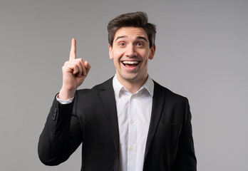 Genius Idea. Resourceful 30S Aged businessman.Eureka Moment,Pointing Finger Up