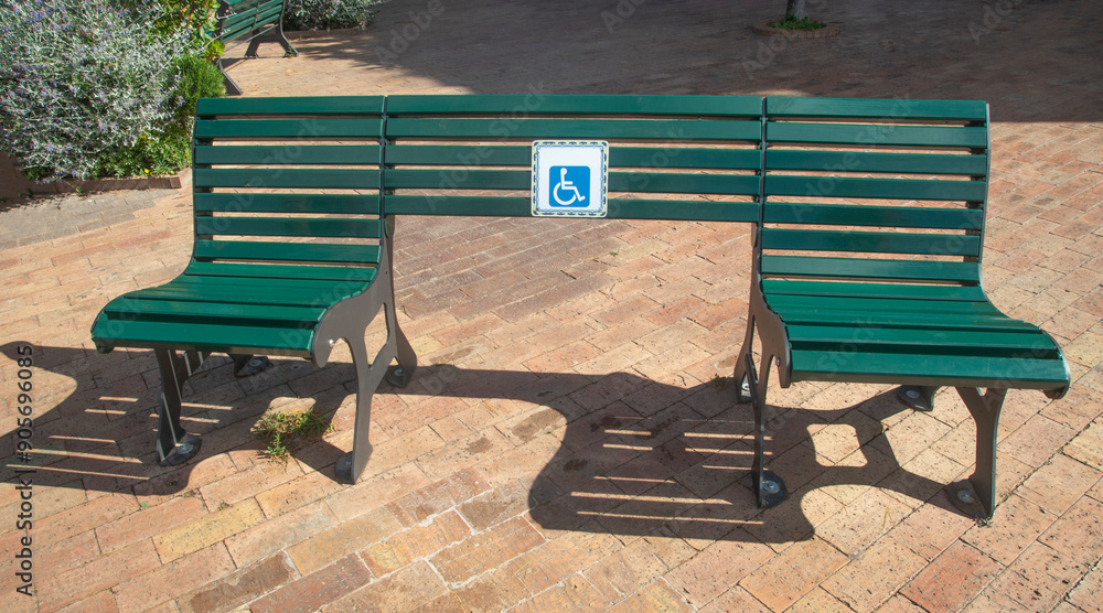 Wall mural green park bench with wheelchair space