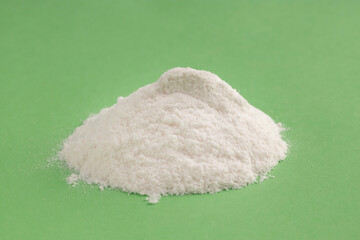 Sodium Bicarbonate - Crystalline solid compound on green Background