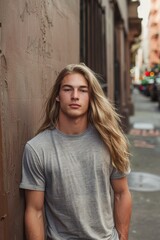 Fototapeta premium Young Man Wearing Gray T Shirt in Urban Setting