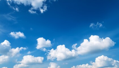 Fototapeta premium little white clouds in summer blue sky