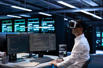 IT specialist using VR headset to do maintenance on server rows in computer network security data center. Engineer using virtual reality to do checkup on mainframes providing processing resources