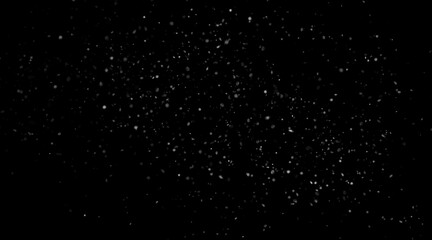 Falling small transparent flakes of snow, a winter blizzard