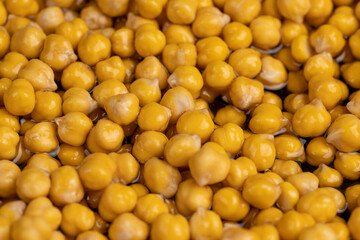 chickpeas porridge with honey during cooking