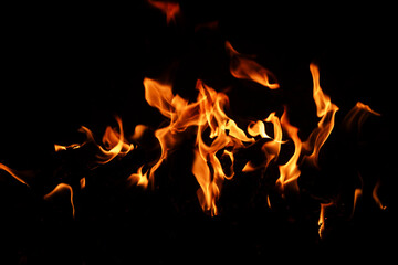 Texture of fire on black background. Abstract fire flame background. Large burning fire. Blaze fire...