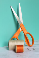Scissors, thread, and pins for crafts and embroidery