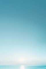 Obraz premium A person riding a surfboard in the ocean, with sun shining and calm waters