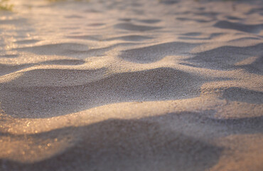 Wavy sand in the sun side view