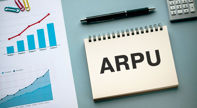 There is notebook with the word ARPU. It is an abbreviation for Average Revenue Per User as eye-catching image.