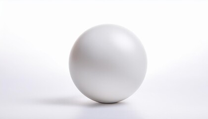 a white ball is sitting on a white surface