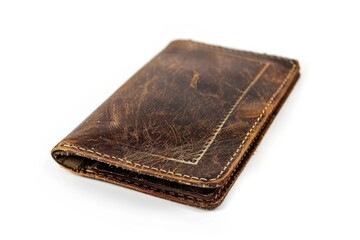 A close-up of a brown leather wallet placed on a white surface