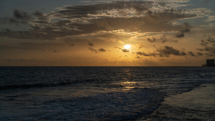 A dramatic sunset on the sri lanka with clouds and the sea  