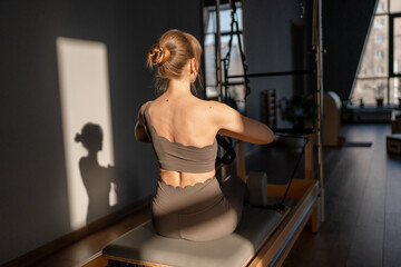 Modern Pilates studio with bright, spacious windows for exercise and wellbeing
